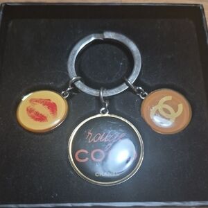 CHANEL Rouge Coco Keychain - Black, Gold, and Brown